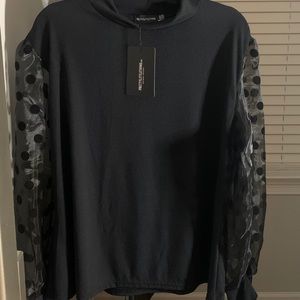 Ribbed High Neck Sheer Polka Dot Top